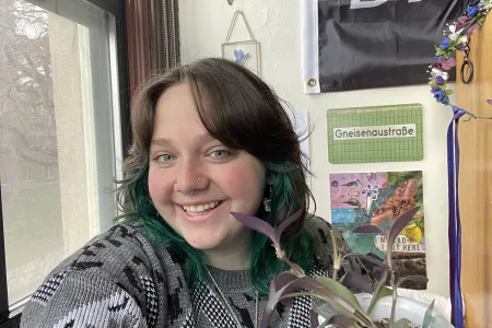 Katie Durow ’25 with plant.