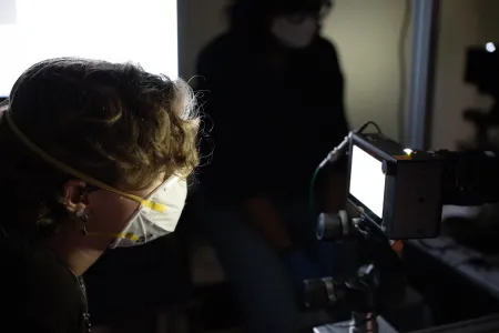 Student looking at screen in lab