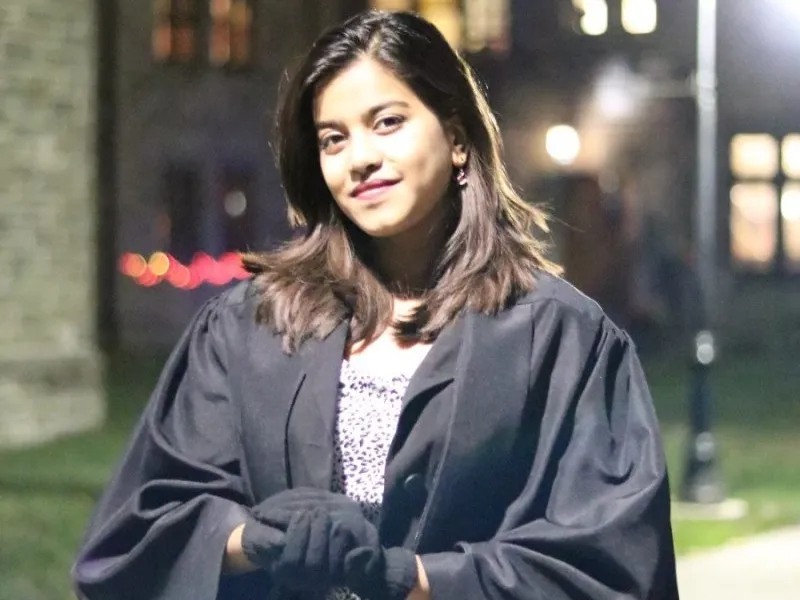 Kripa Lamicchane in a graduation gown. 