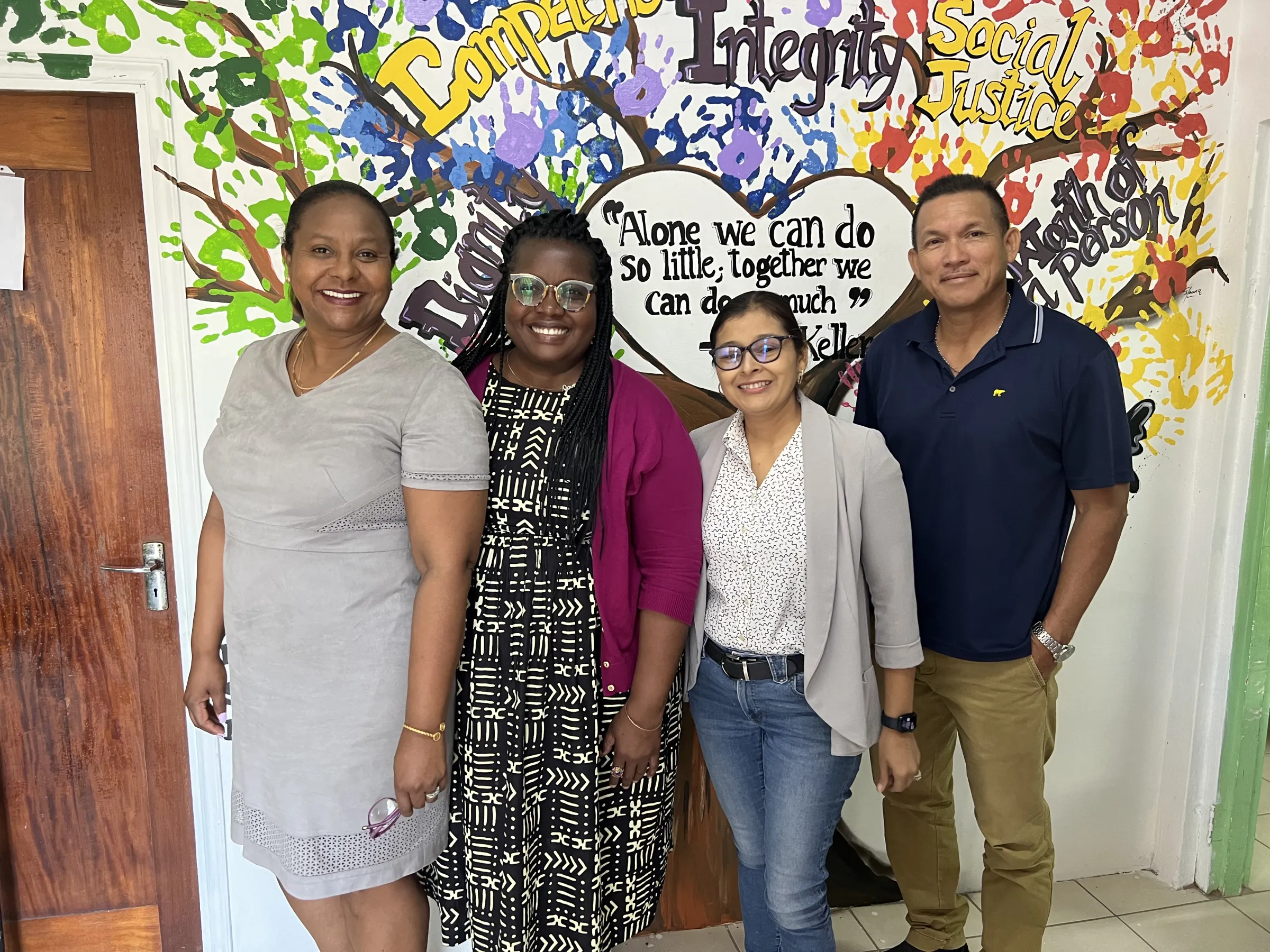 Tamarah Moss with University of Belize faculty