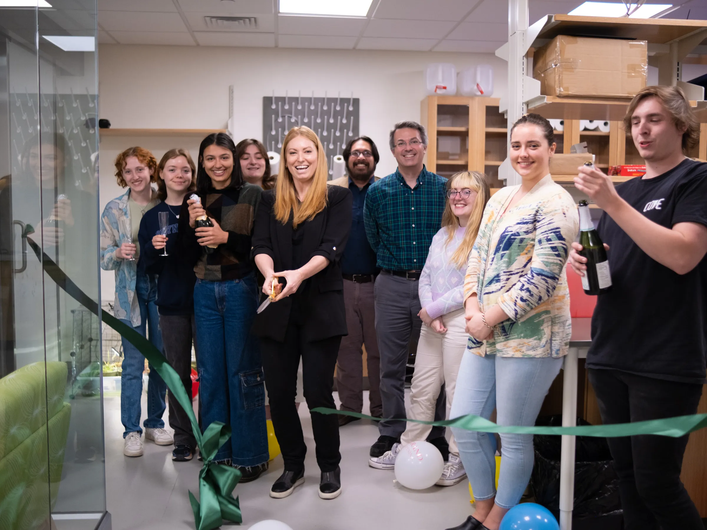 Asja Radja with students at lab opening