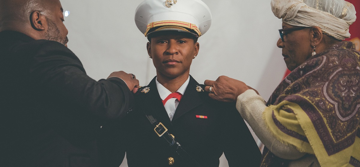 Aneesah Latise Akbar-Uqdah has her lieutenant bars pinned on by her uncle Christopher Fowler & mother Hajja Khalilah Karim-Rushdan