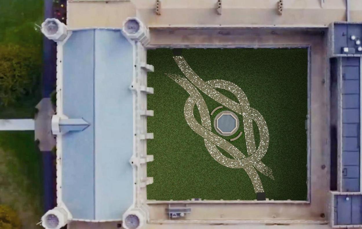 An aerial view of the Cloisters with a braided stone path