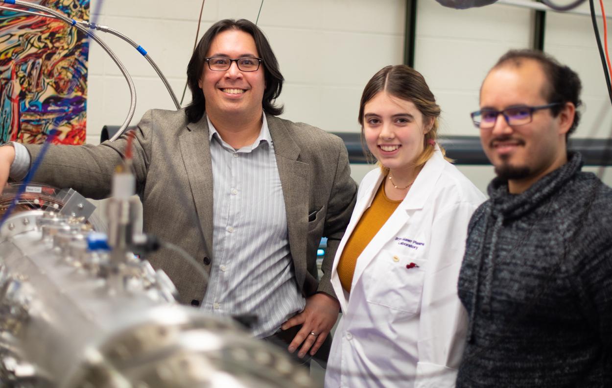 Assistant Professor of Physics David Schaffner (left), Maise Shepard '20, and Ph.D. Candidate Carlos Cartegena