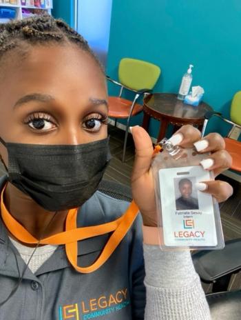 Selfie of Fetama Sesay with internship badge