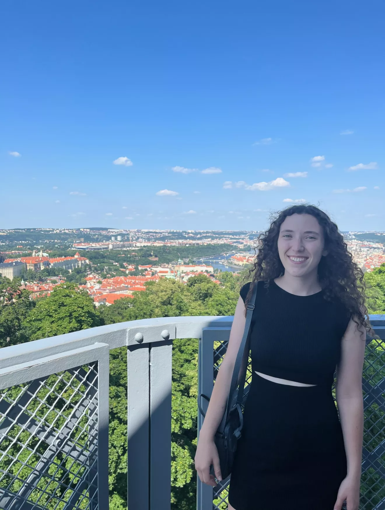 Anna Lowrance standing in front of a view of Prague