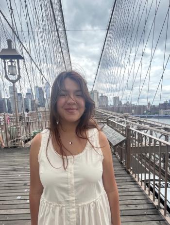 Fer Standing on the Brooklyn Bridge