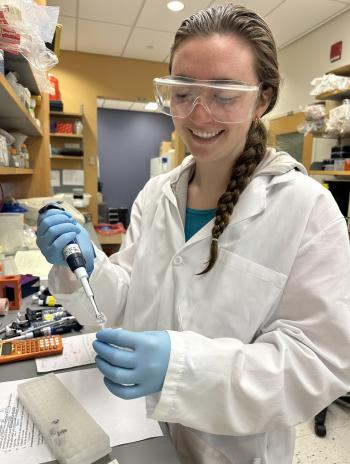 Student working in a lab. 