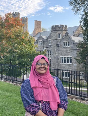 Sinthia standing in front of Rockefeller Hall.