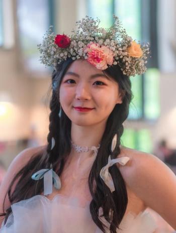 Yuan Tan in a flower crown. 