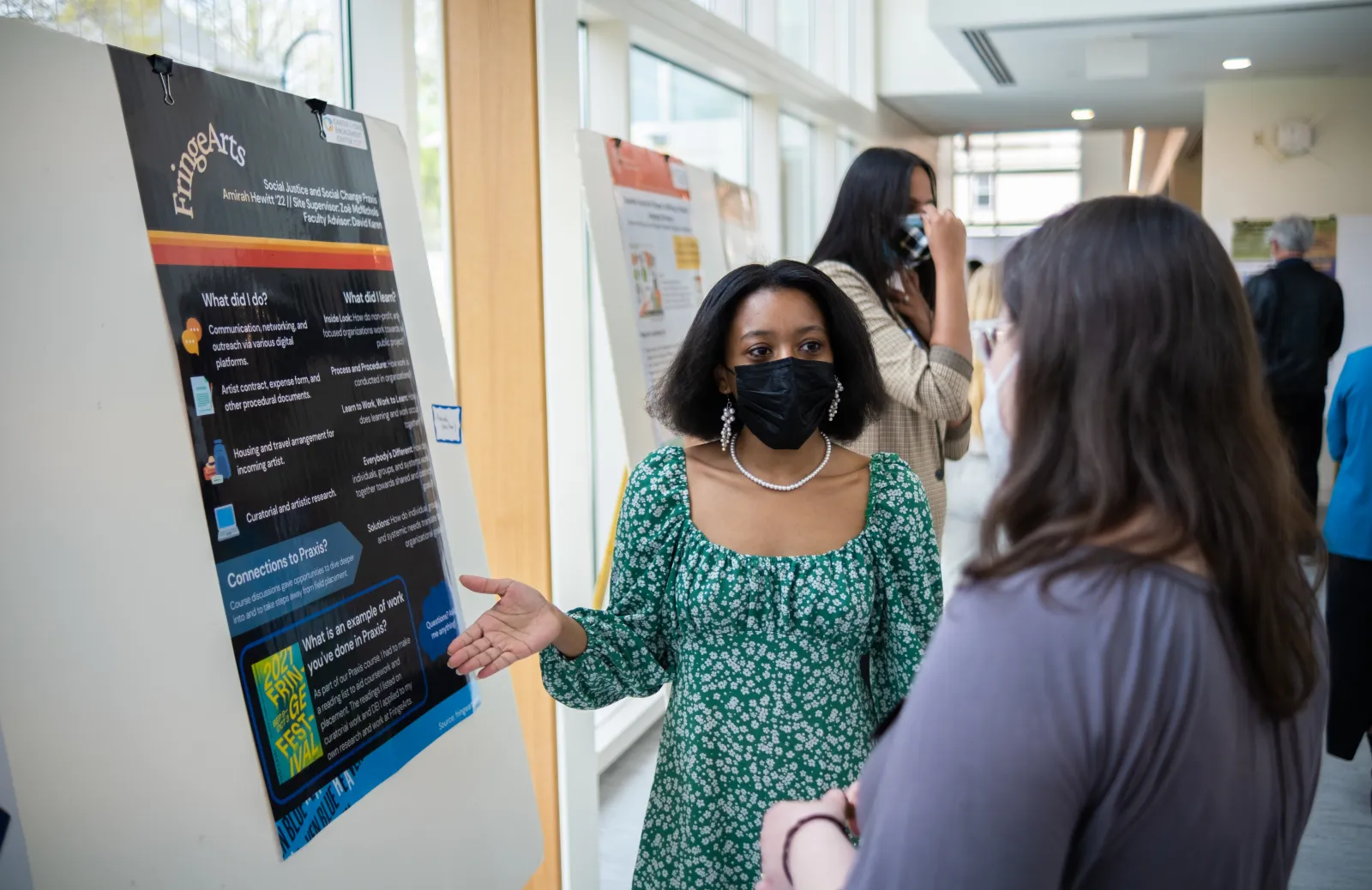 Students attending the Praxis Poster Session 2022