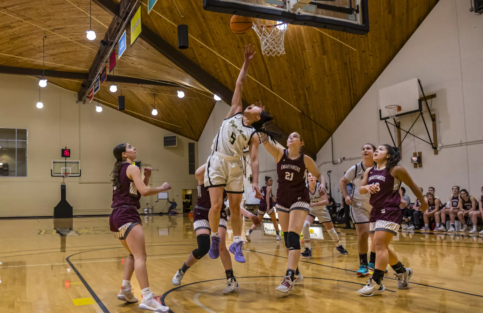 Athletes playing basketball. 