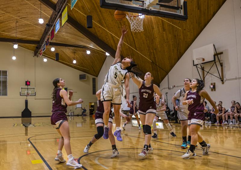 Athletes playing basketball. 