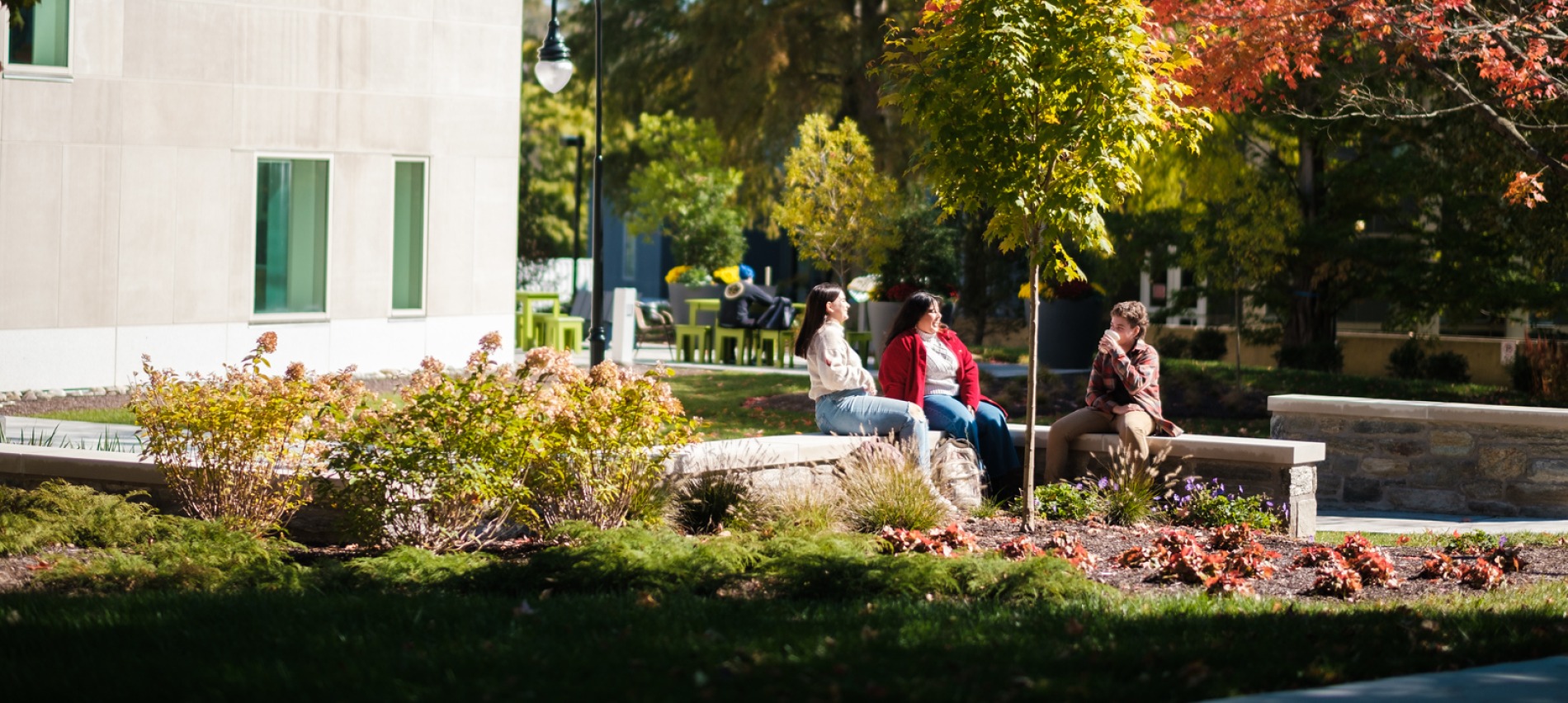 The Well exterior with students 