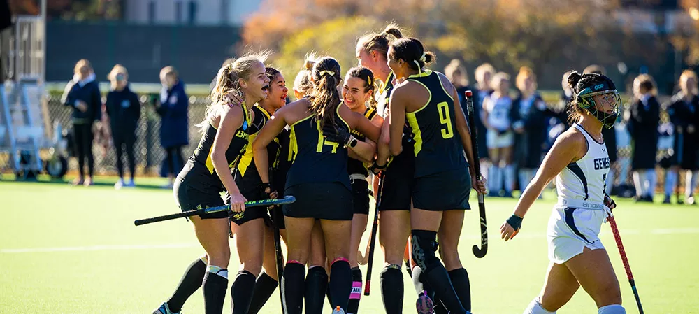 Field Hockey team hugs after winning Nov. 13 game