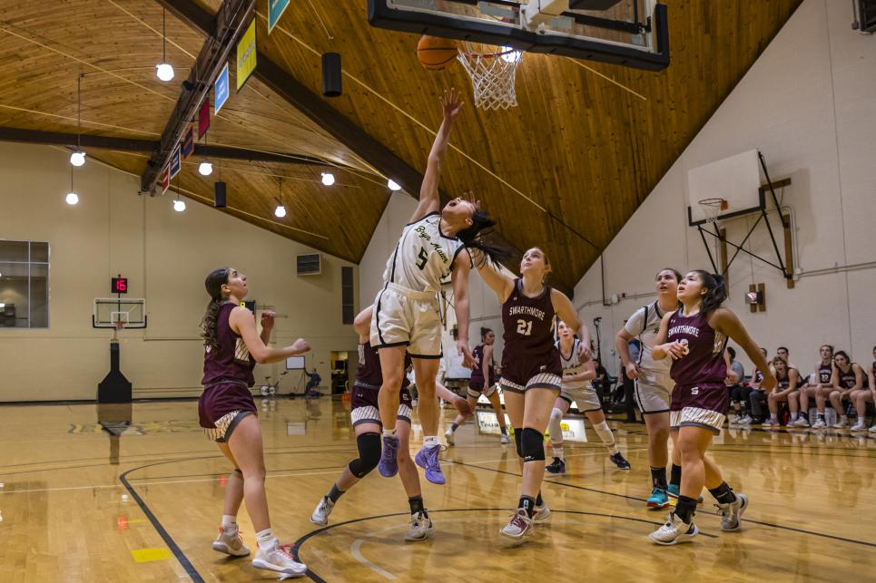 Athletes playing basketball. 