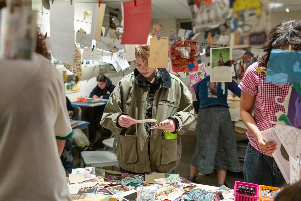 Students select supplies and begin collaging