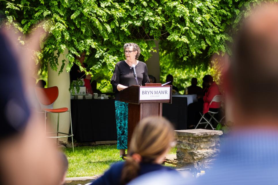 Kim Cassidy gives opening remarks at her final Staff Picnic as President of the College