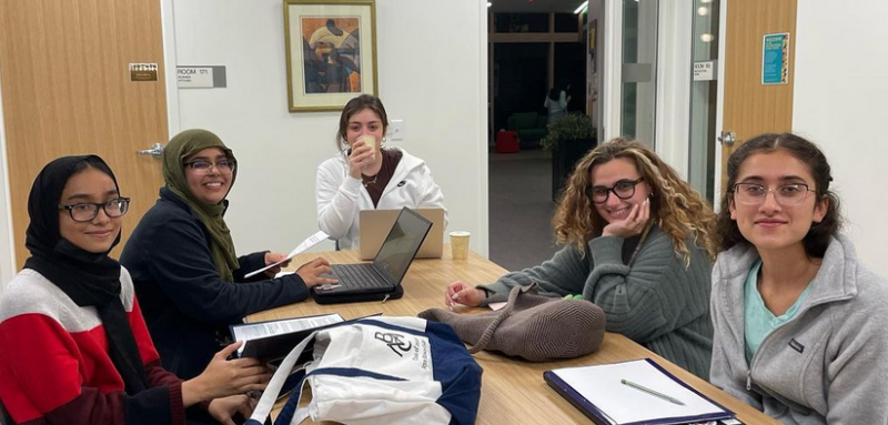 Image of students studying in The Well Kitchen at the Breaking Barriers Owl Night Study Night