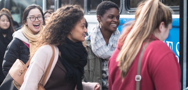 students on blue bus