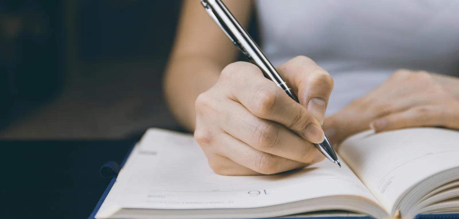 Writing in a notebook