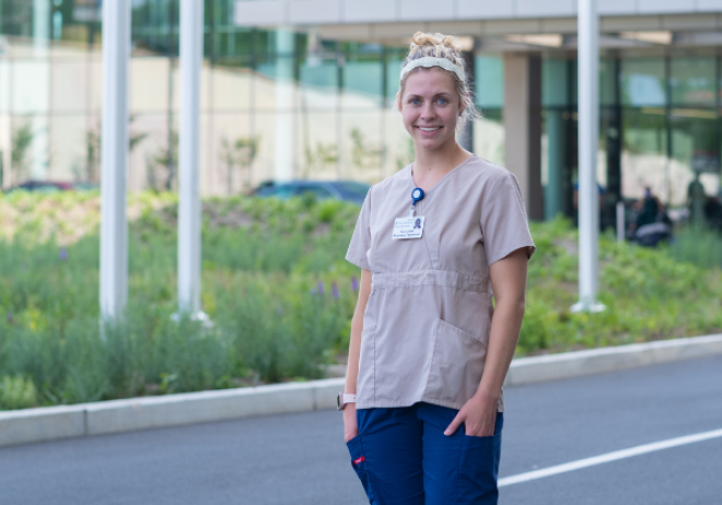 photo of Dana Caldwell standing outside hospital