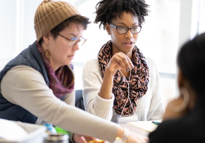 graduate student discussion in classroom