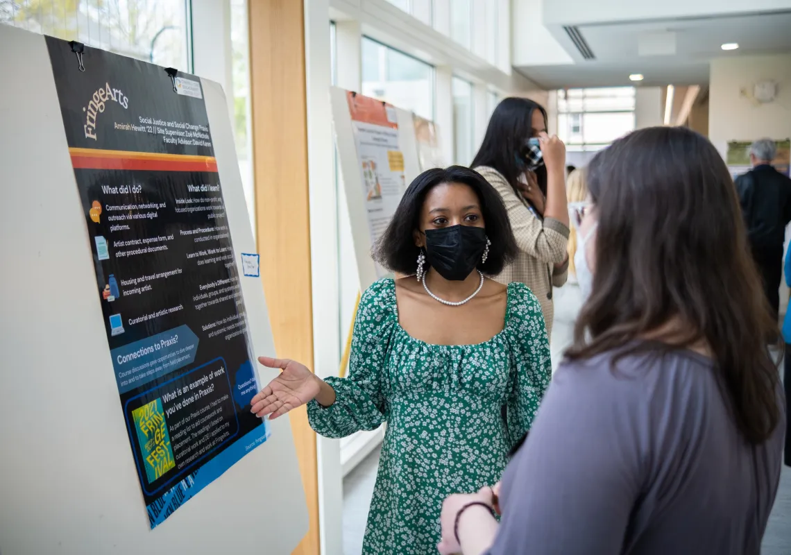 Students attending the Praxis Poster Session 2022