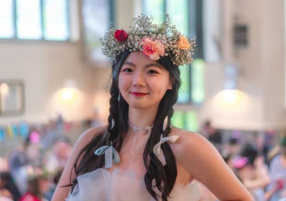 Yuan Tan in a flower crown. 