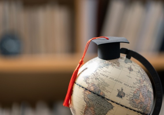 Globe with graduation cap