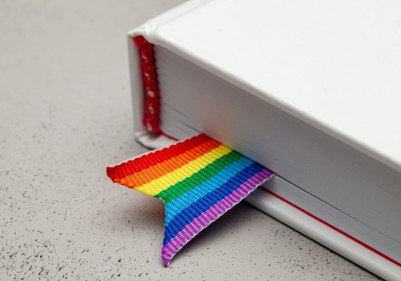 Book with rainbow ribbon