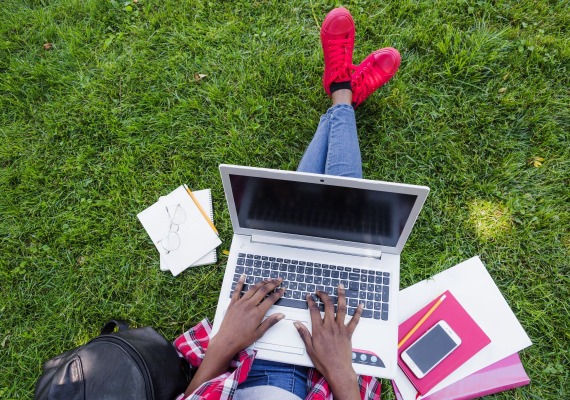 Student with laptop stock