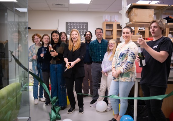 Asja Radja with students at lab opening