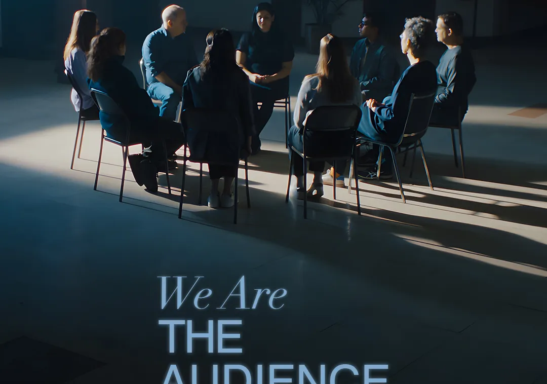 Film poster for We Are the Audience. A group of people sit in a chairs arranged in a circle.