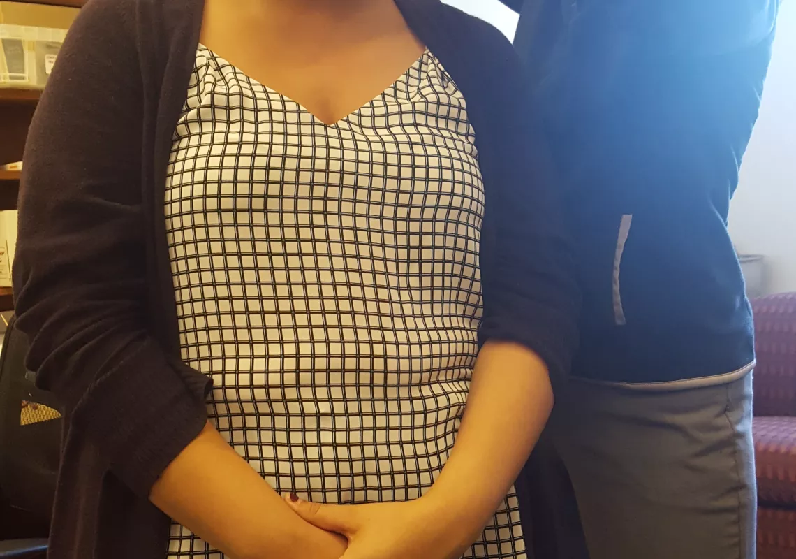Beth Seltzer gets Jancy Munguia suited up.