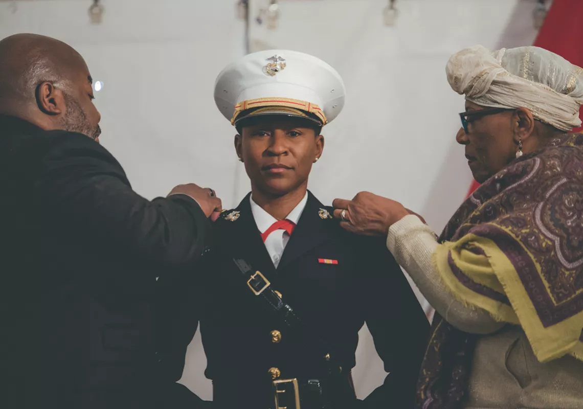 Aneesah Latise Akbar-Uqdah has her lieutenant bars pinned on by her uncle Christopher Fowler & mother Hajja Khalilah Karim-Rushdan