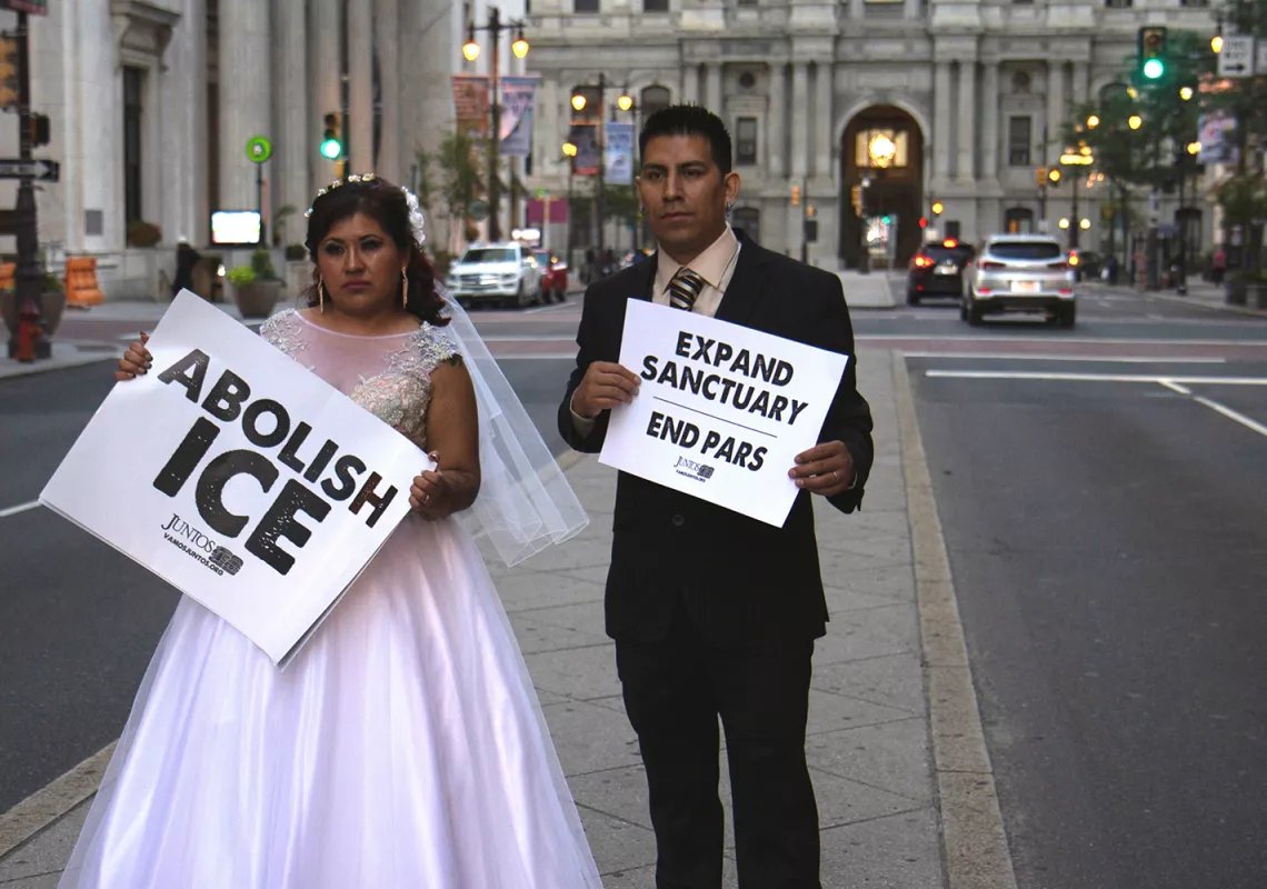 Protesters in wedding clothes 