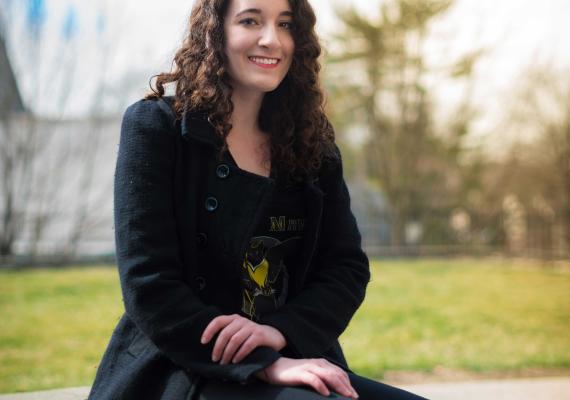 Lindsey Marinello Sitting on a Bench