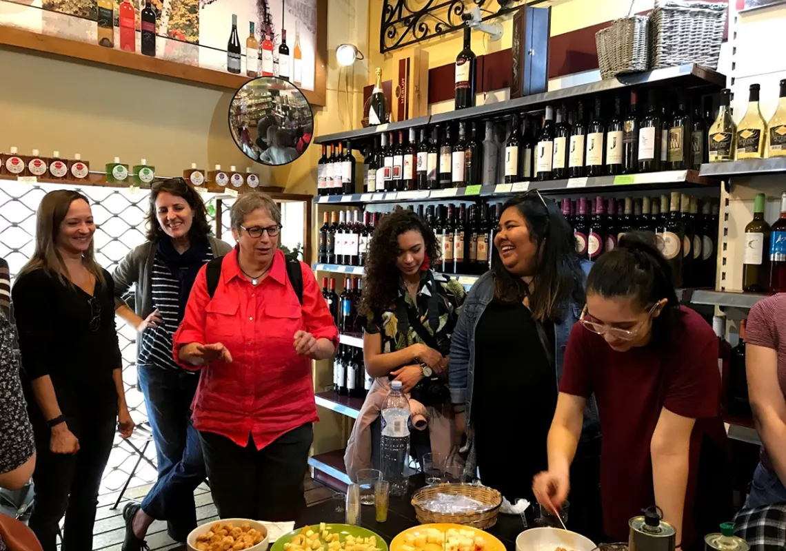 students and faculty at an olive oil tasting in Greece