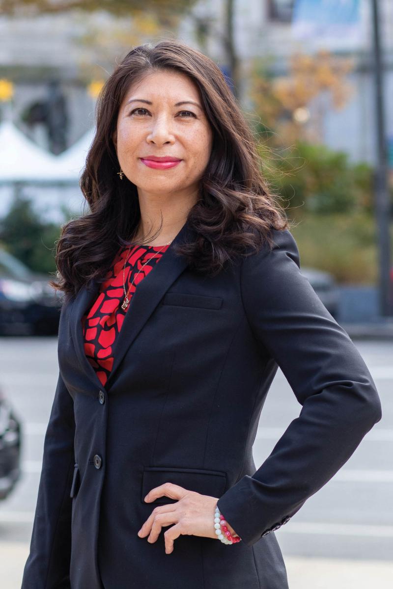 Portrait of Romana Lee-Akiyama wearing a black blazer