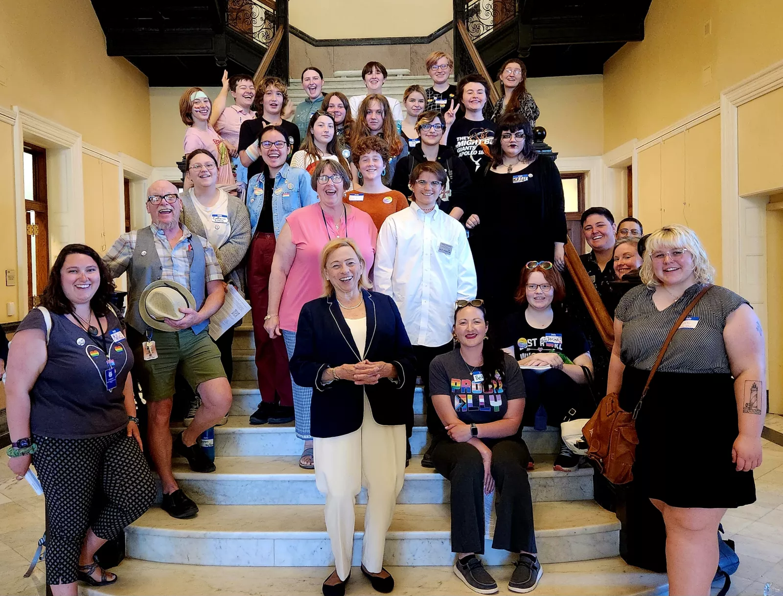 Group picture of OUT Maine staff, public educators, and high school students