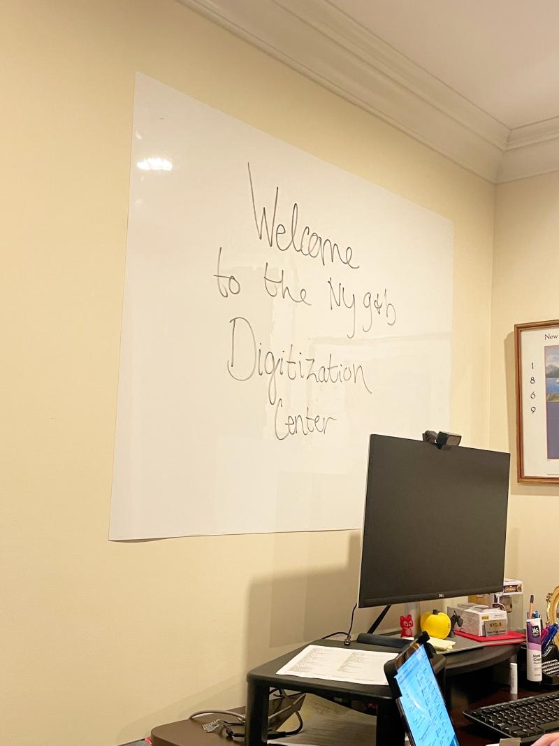 Room with a welcome sign on the wall whiteboard. 