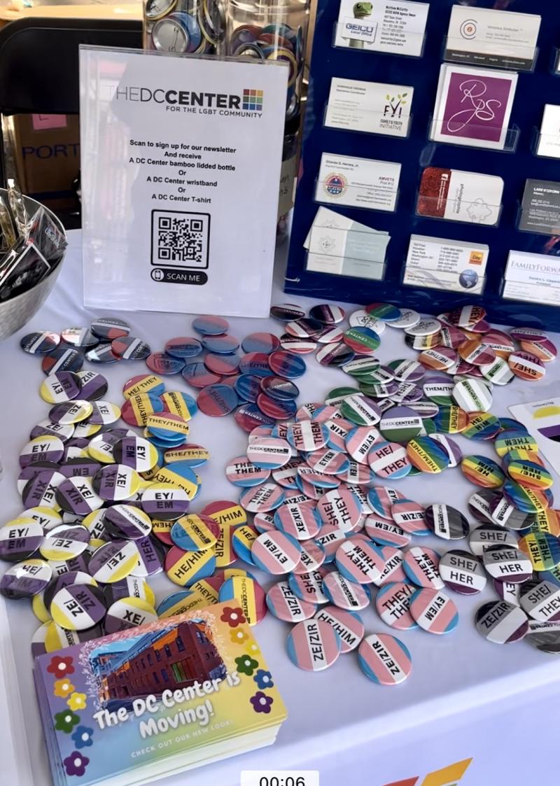 Pins on a table at the DC Pride Parade