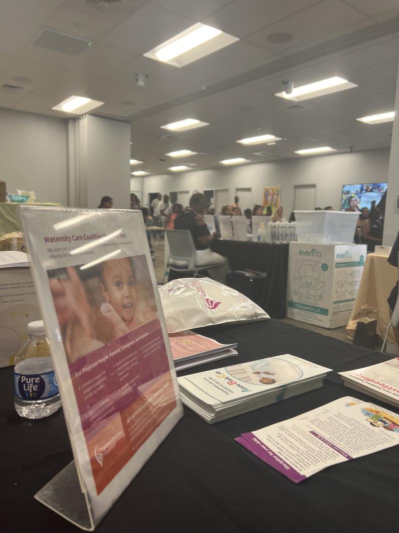 Table with brochures and fliers. 