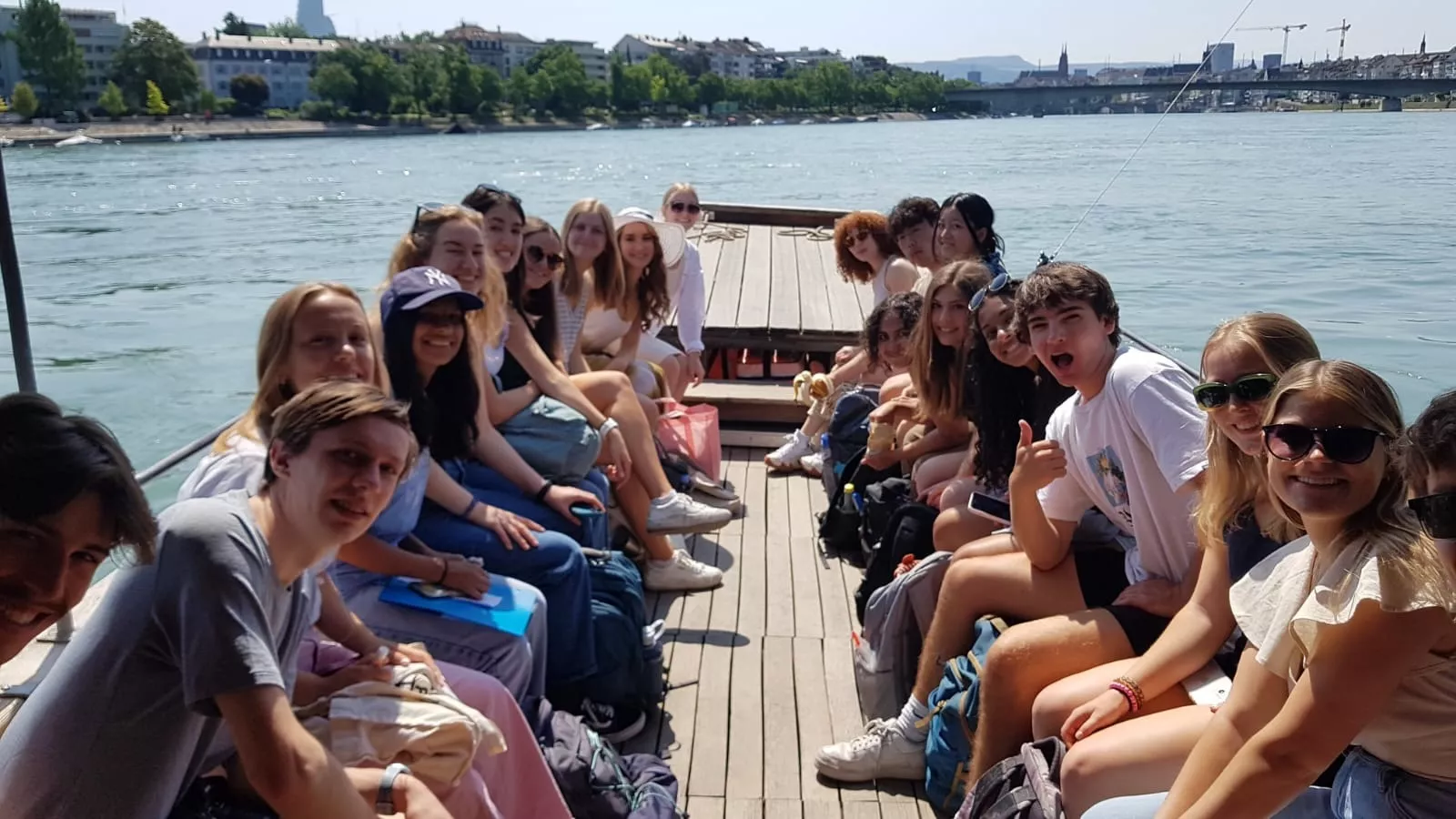 People in a ferry on a river