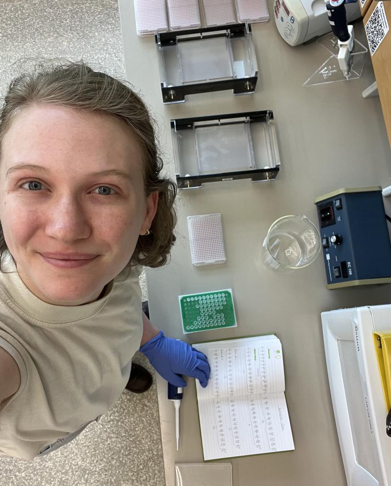 Skylar taking a selfie in a lab