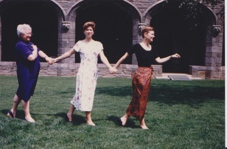 Women recreating sculpture of the Three Graces