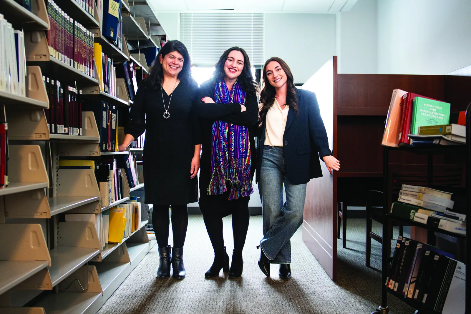 Deeya Haldar, Mary Florence Sullivan, and Sarah D'Antonio in the Villanova legal clinic library