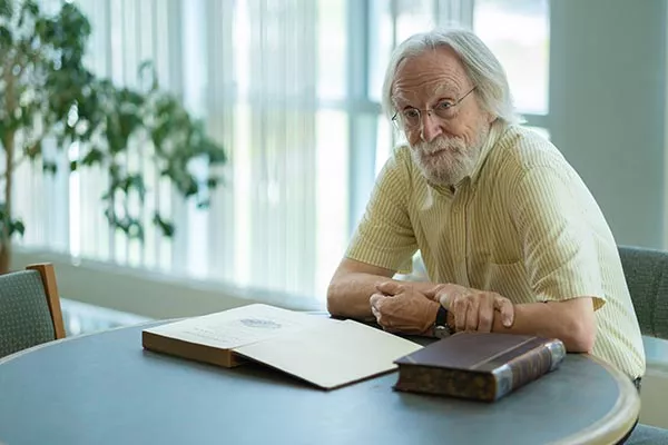 Dr. Dunham with Mobius Book