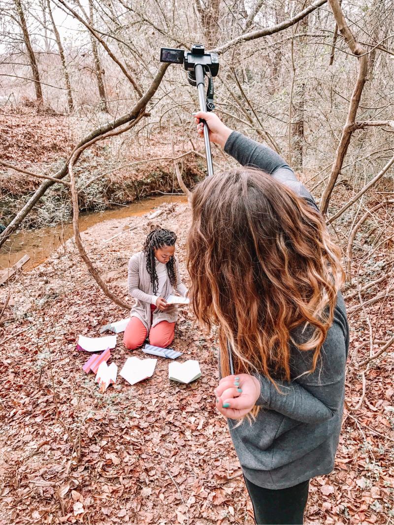 Image of photographer shooting dancer in nature